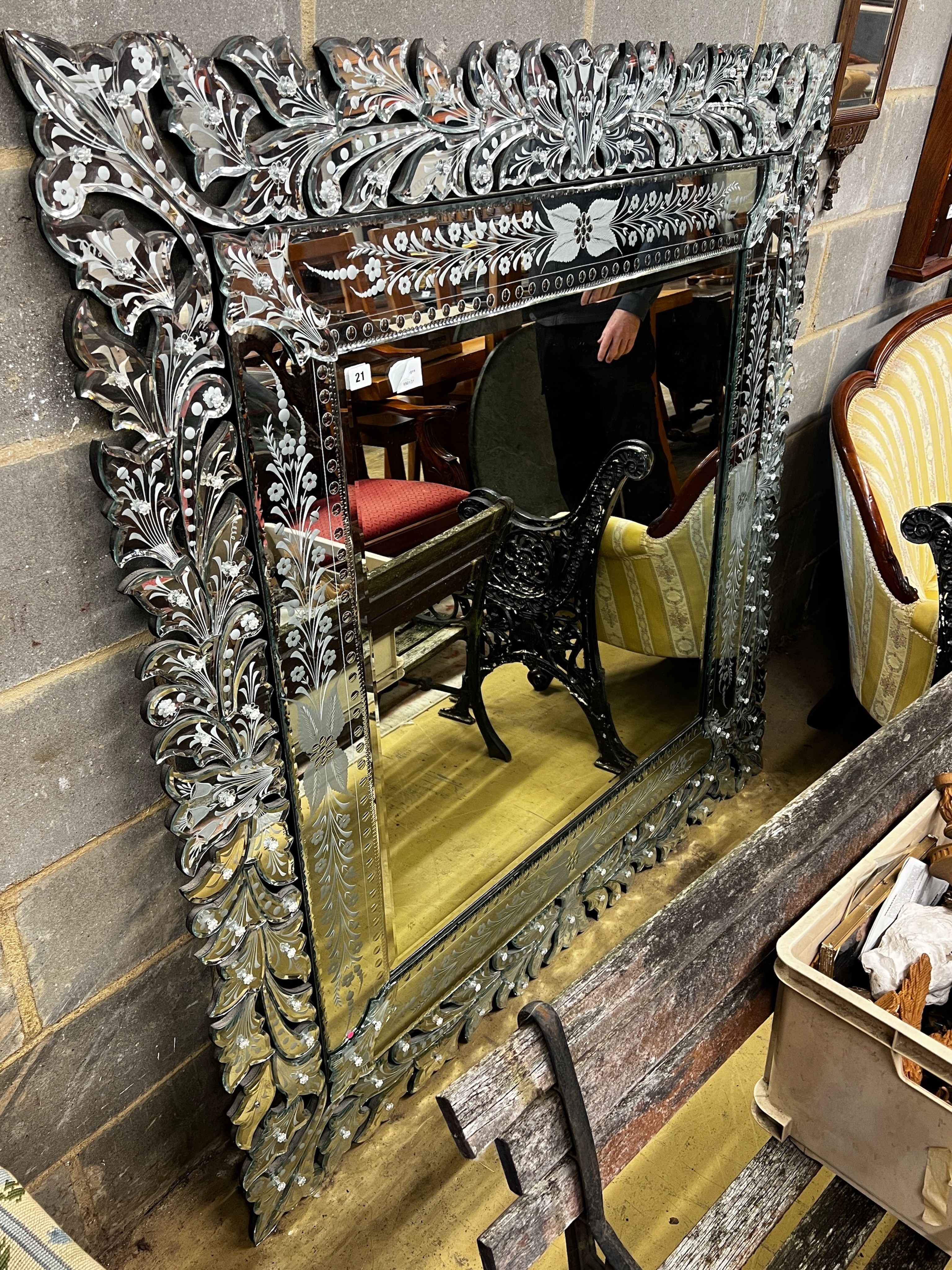 A large rectangular Venetian style etched wall mirror, width 146cm, height 146cm